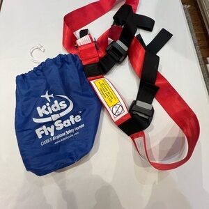 Cares Kids Fly Safe Airplane Safety Harness - Red and Black